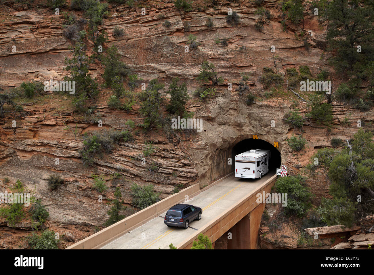 RV entering east portal of Zion Tunnel, Zion – Mount Carmel Highway, Zion National Park, Utah, USA Stock Photo