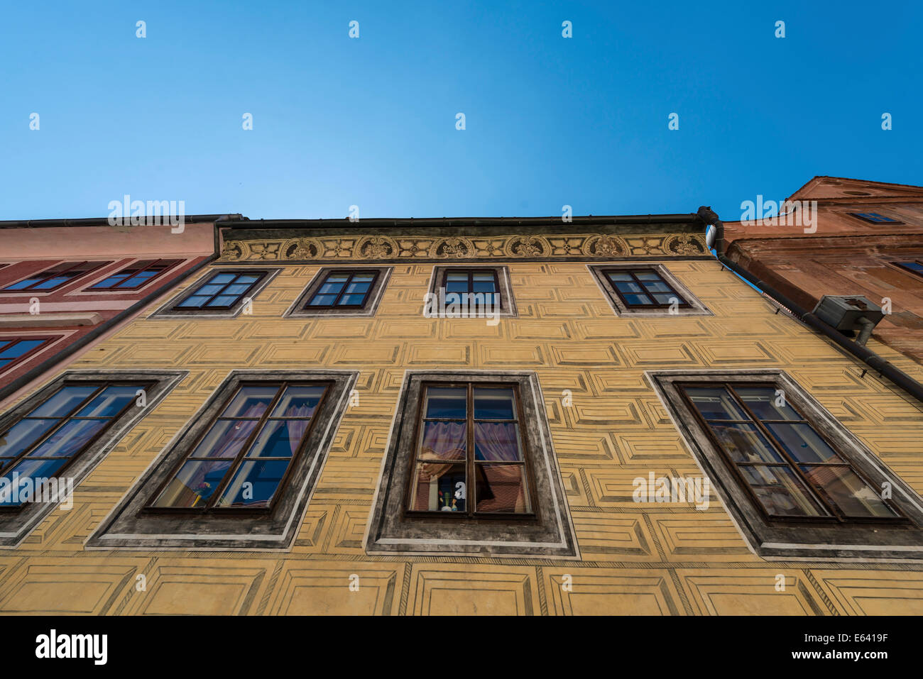 Yellow façade of a historic building, Český Krumlov, Czech Republic Stock Photo