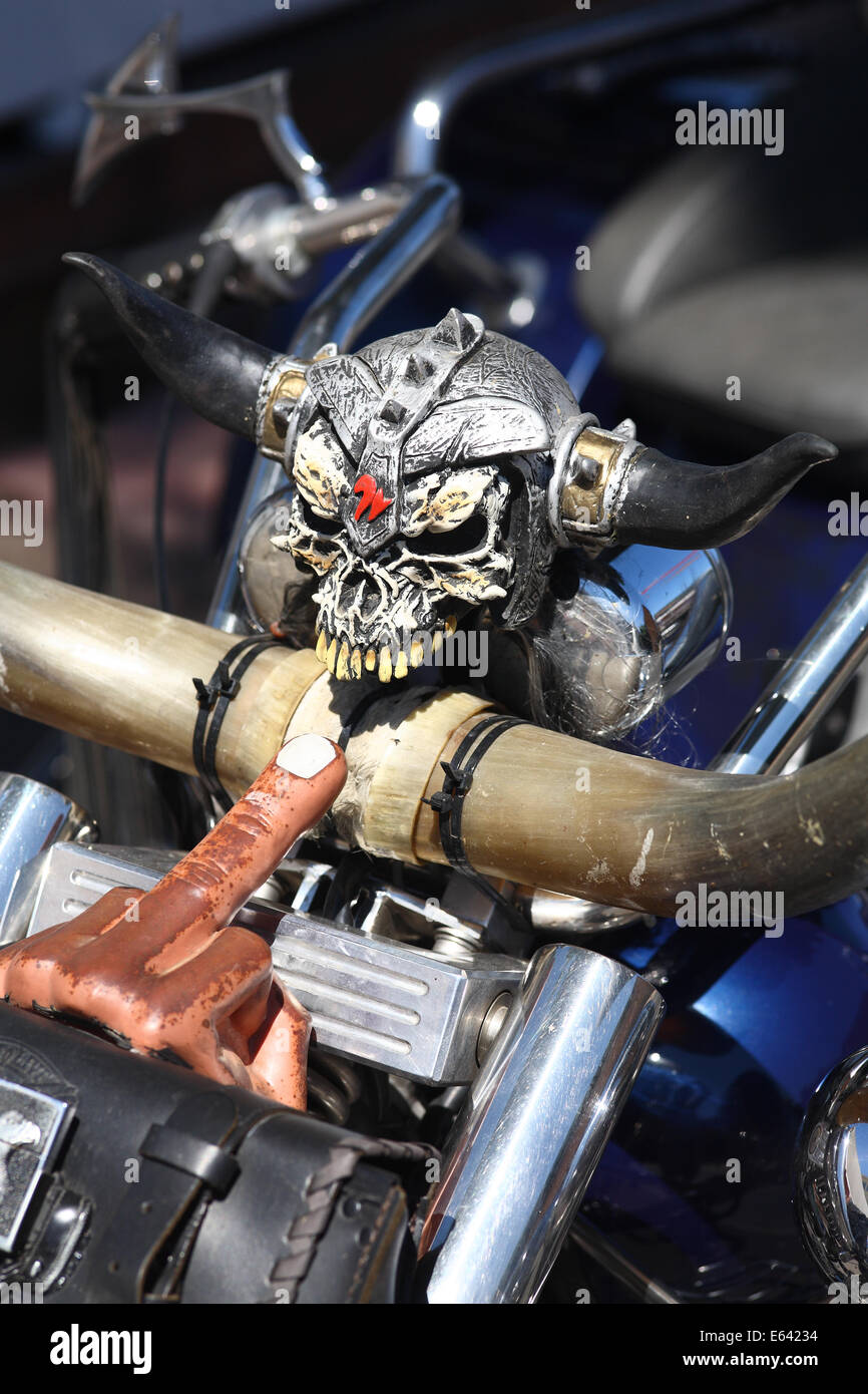 skull and finger on front of 3 wheeled motorbike Stock Photo
