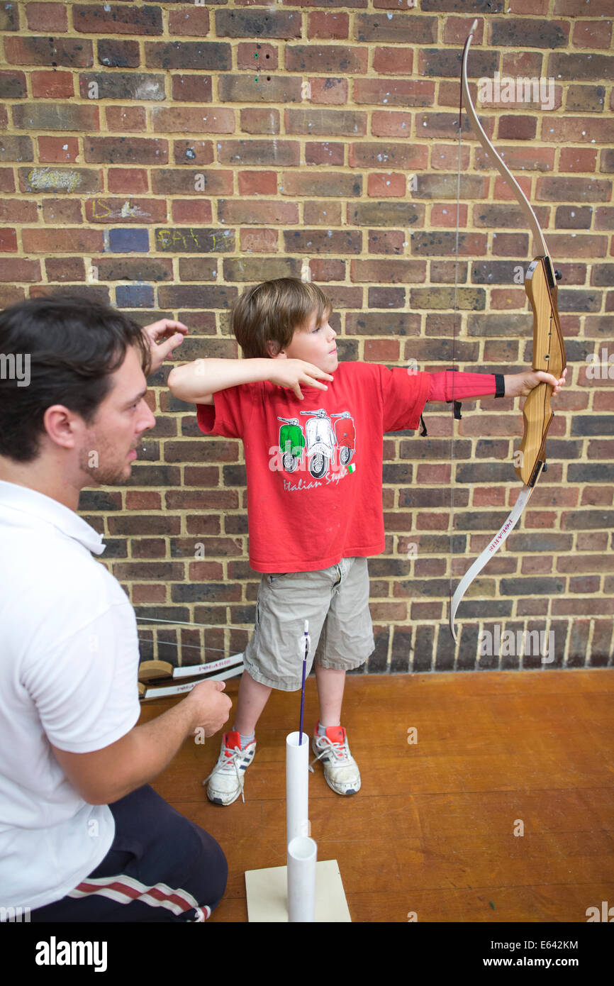 Indoor archery lesson at 'Experience Archery' in London, England, UK
