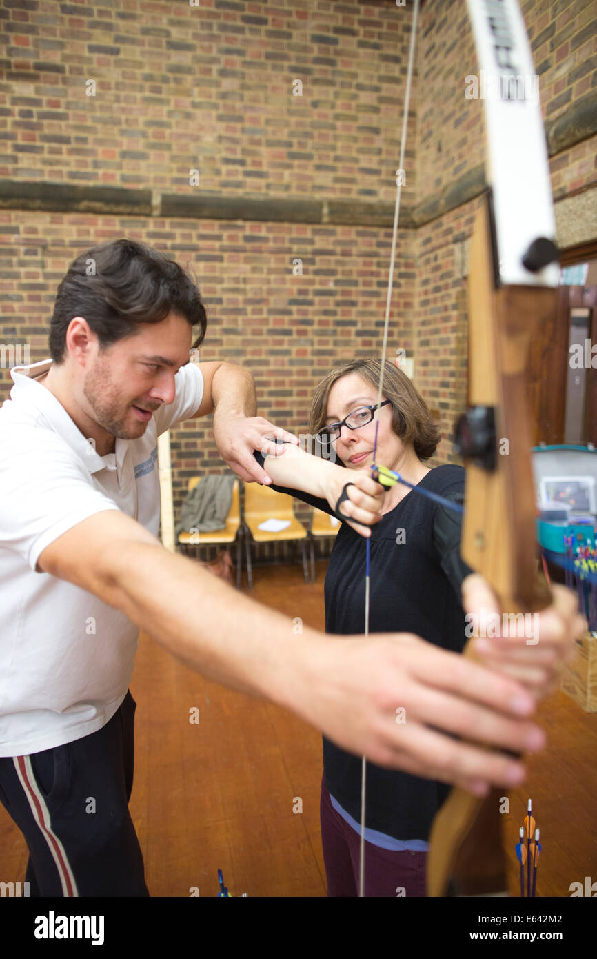 Indoor archery lesson at 'Experience Archery' in London, England, UK