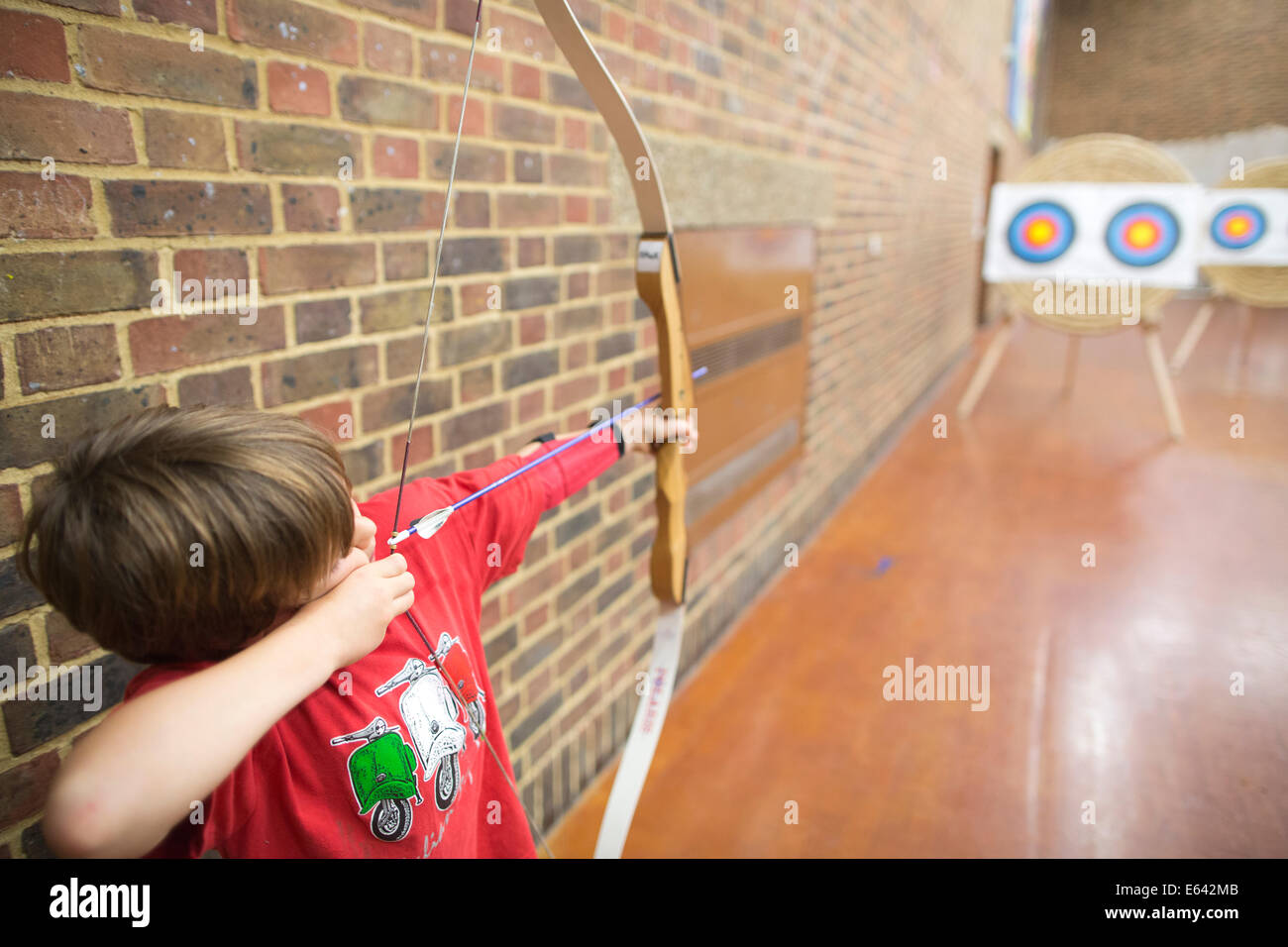 Indoor archery lesson at 'Experience Archery' in London, England, UK