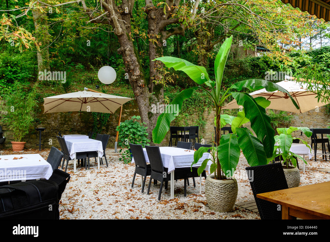 A shady terrace garden in a hotel in Languedoc-Roussillon, France Stock Photo