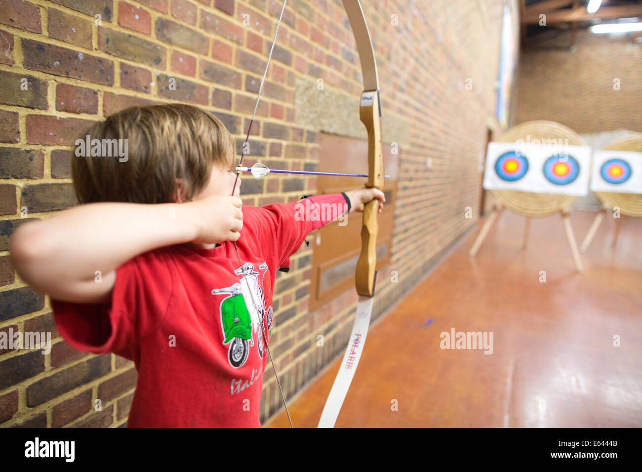 Indoor archery lesson at 'Experience Archery' in London, England, UK