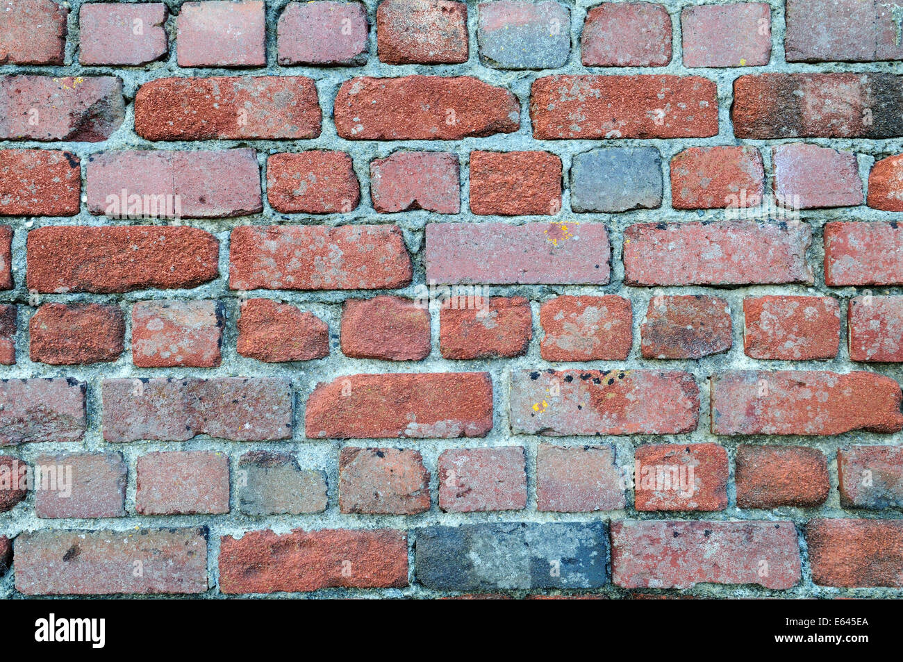 Close up detail of old brick wall made of bricks made from slate waste