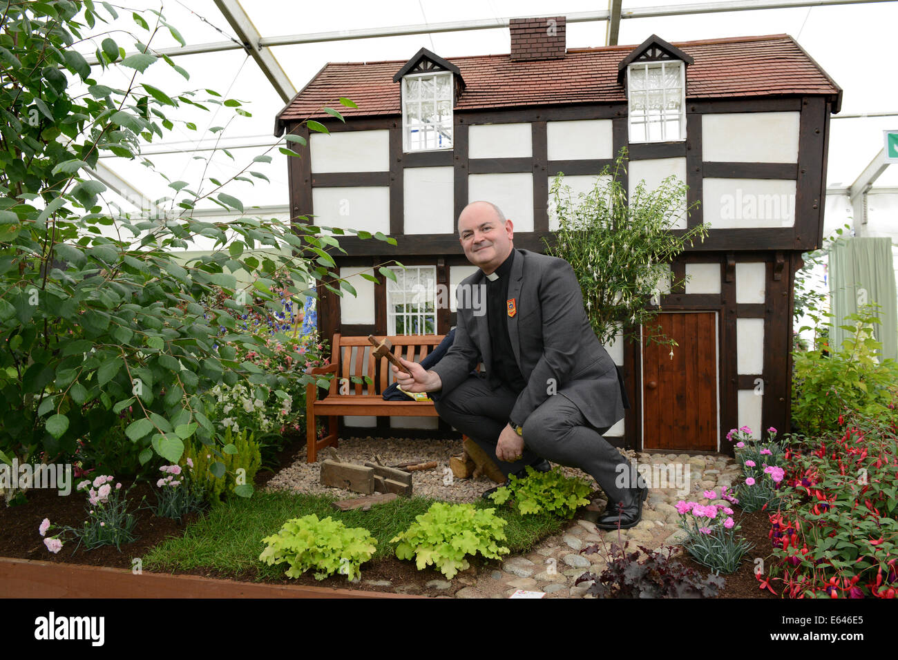 The Canon Chancellor of St Paul's Cathedral in London Rev Mark Oakley at Shrewsbury Flower Show 8th August 2014. Stock Photo