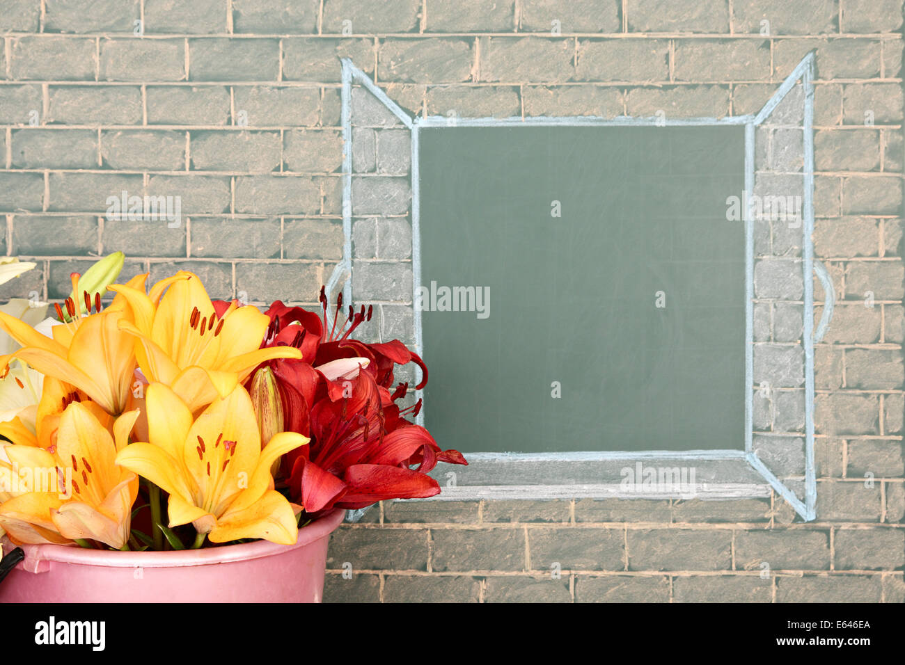 Flowers before illustration on a chalkboard of the open window Stock Photo