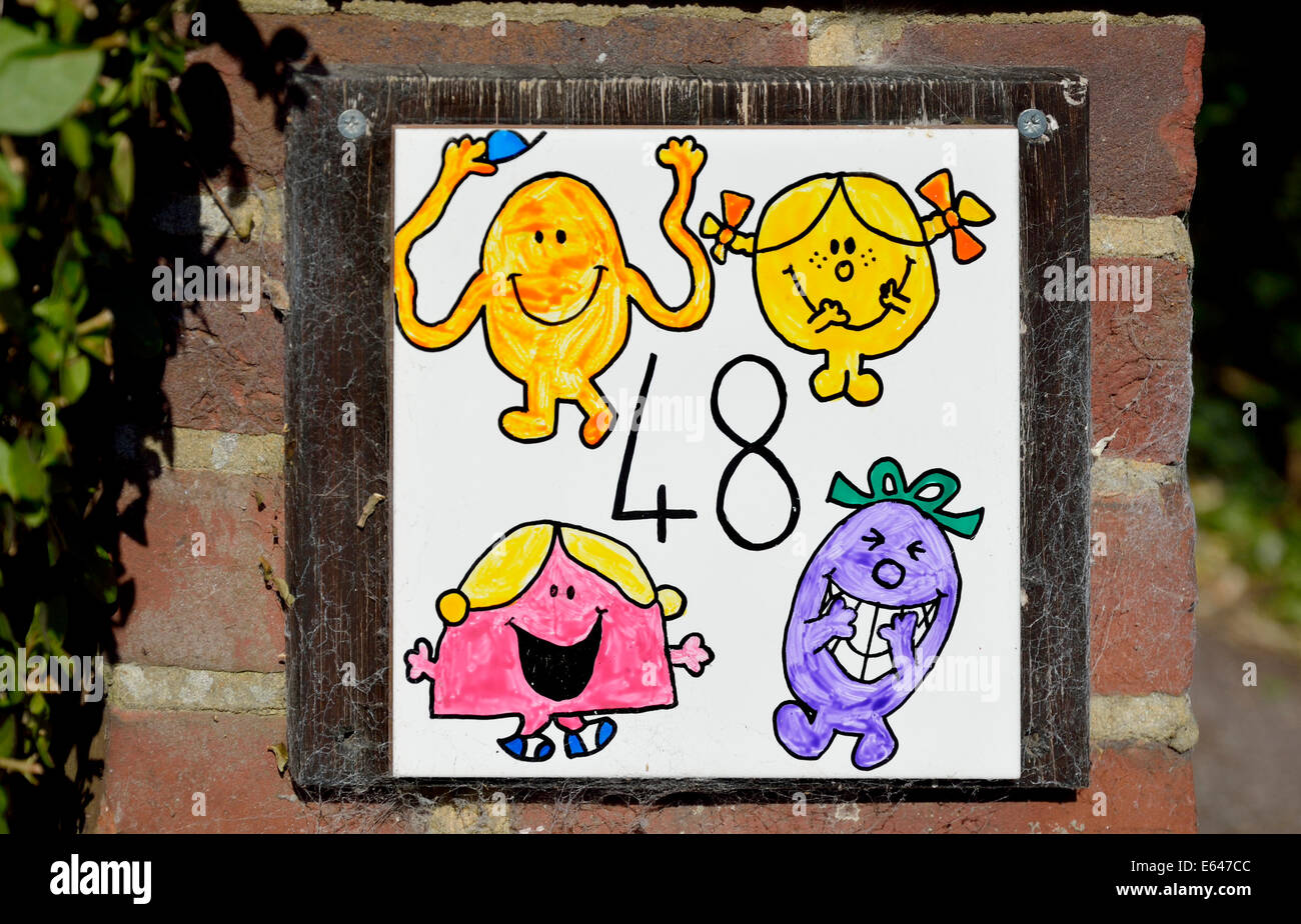 Maidstone, Kent, England. House number tile with Roger Hargreaves' Mr Men and Little Miss characters Stock Photo