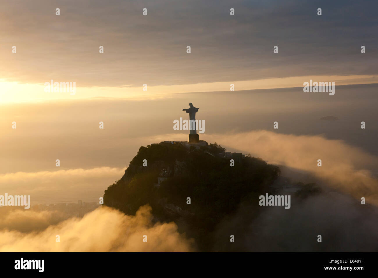 The giant Art Deco statue Jesus known as Cristo Redentor (Christ Redeemer) on Corcovado mountain in Rio de Janeiro Brazil. Stock Photo