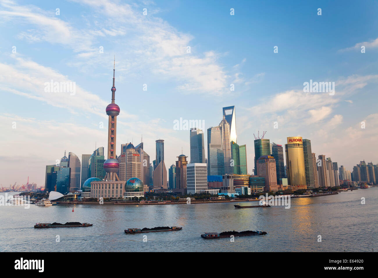 Barges and Pudong skyline, Shanghai, China Stock Photo