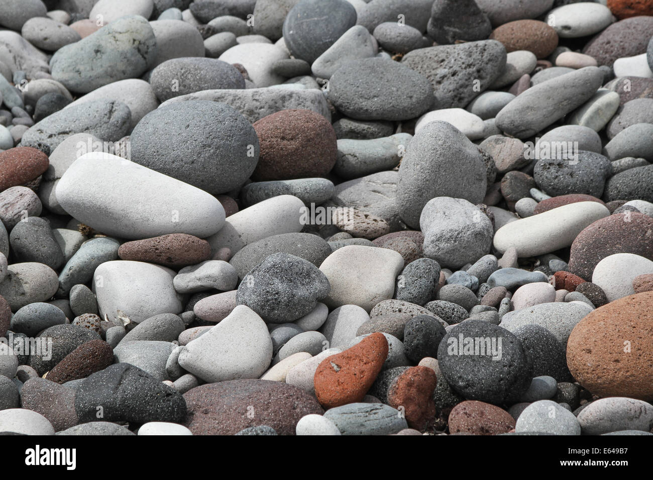 Sea stones background Stock Photo - Alamy