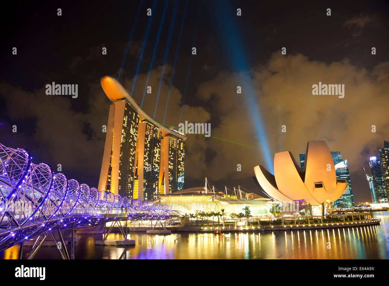 Helix bridge, Marina Bay Sands Hotel & Art Science museum at dusk, Singapore, SE Asia Stock Photo