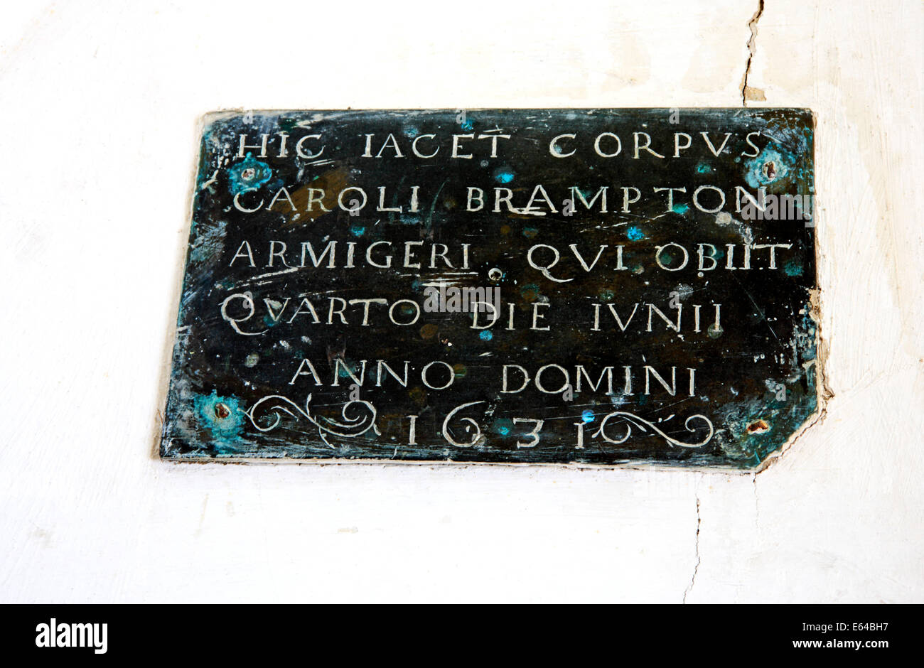 A floor brass inscription plate in the parish church of St Peter at Brampton, Norfolk, England, United Kingdom. Stock Photo
