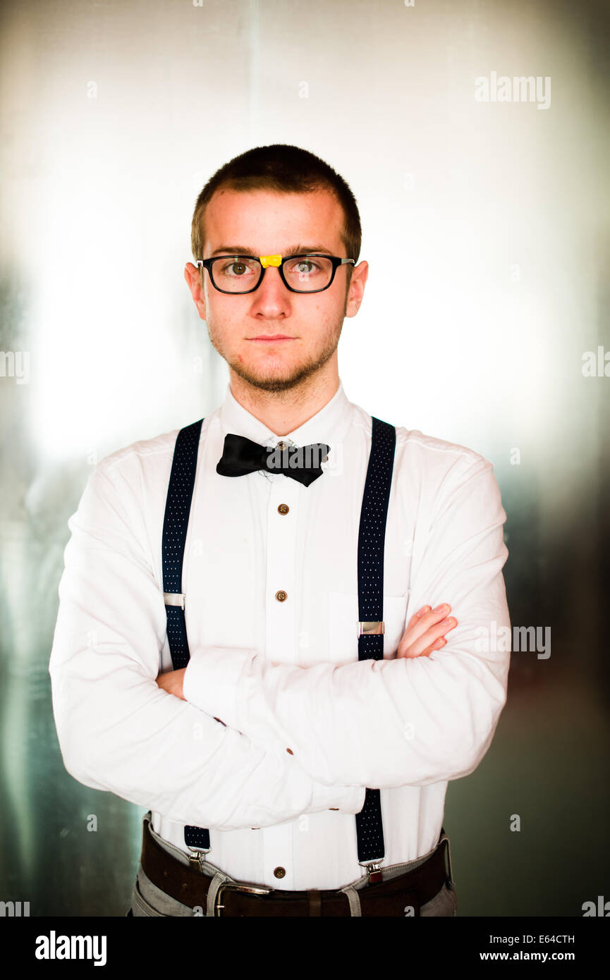 A geek geeky young man dressed in 1950's style American clothing fashion  retro Stock Photo - Alamy