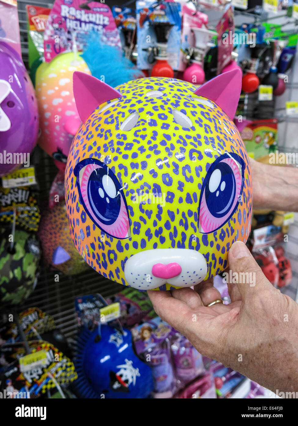 Plastic Animal Head Bicycle Helmet, Walmart Discount Department Store, USA Stock Photo