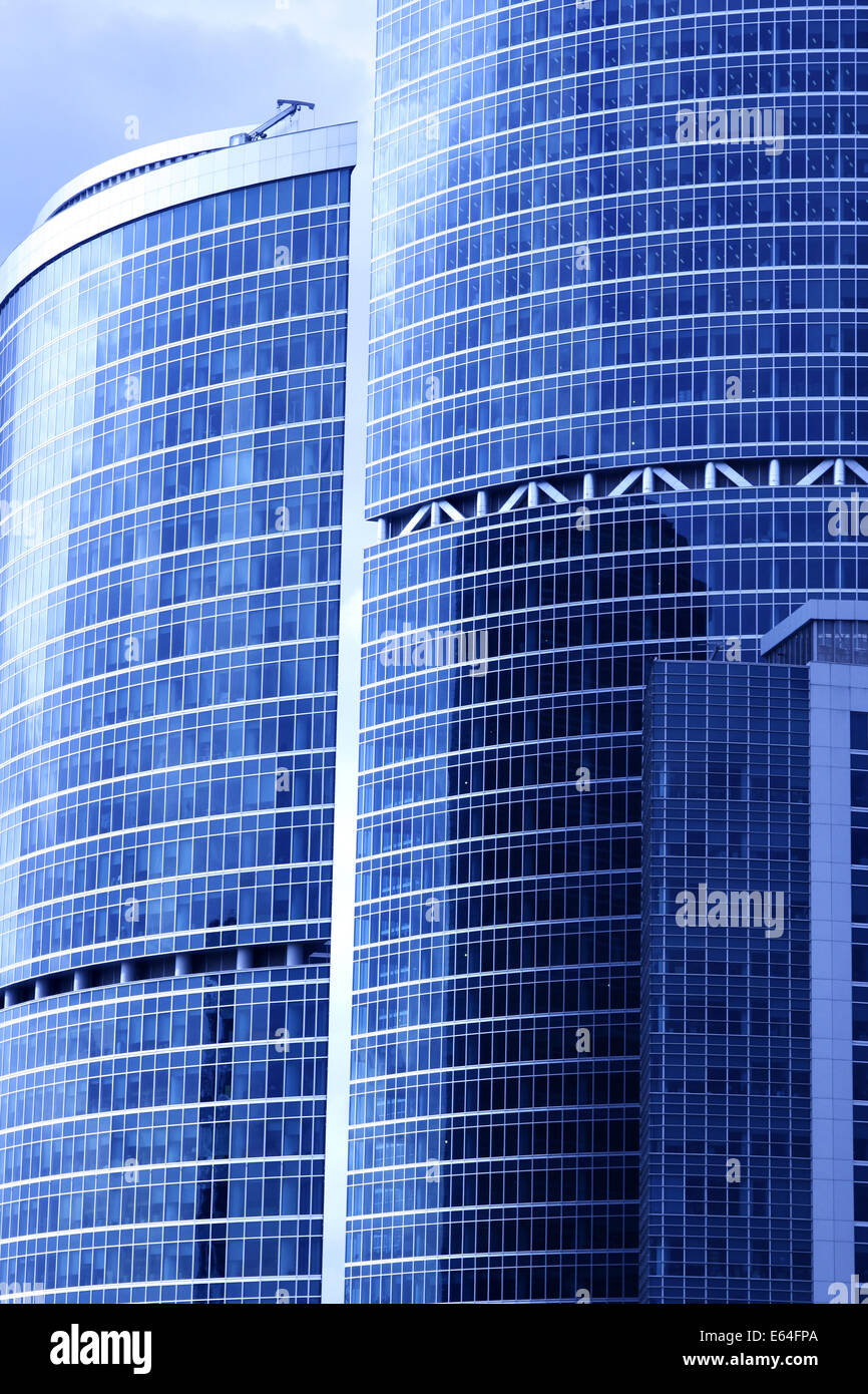 Modern skyscrapers close-up toned in blue color Stock Photo - Alamy