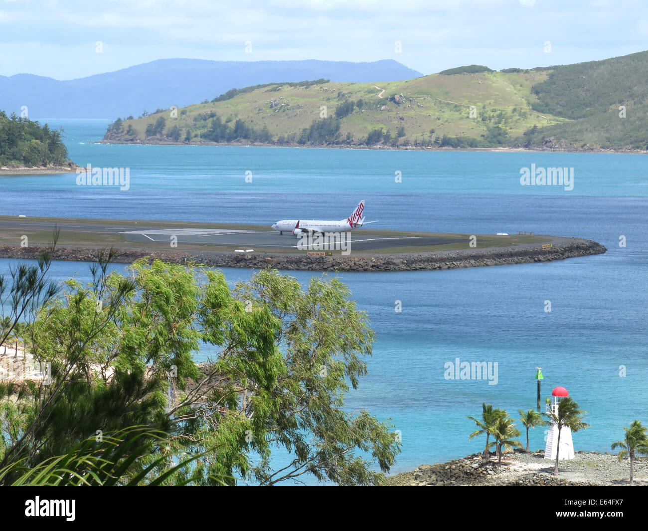 Virgin 737- 400 Airplane awaiting take off at Hamilton Island Airport, Whitsunday Islands, Australia. Stock Photo