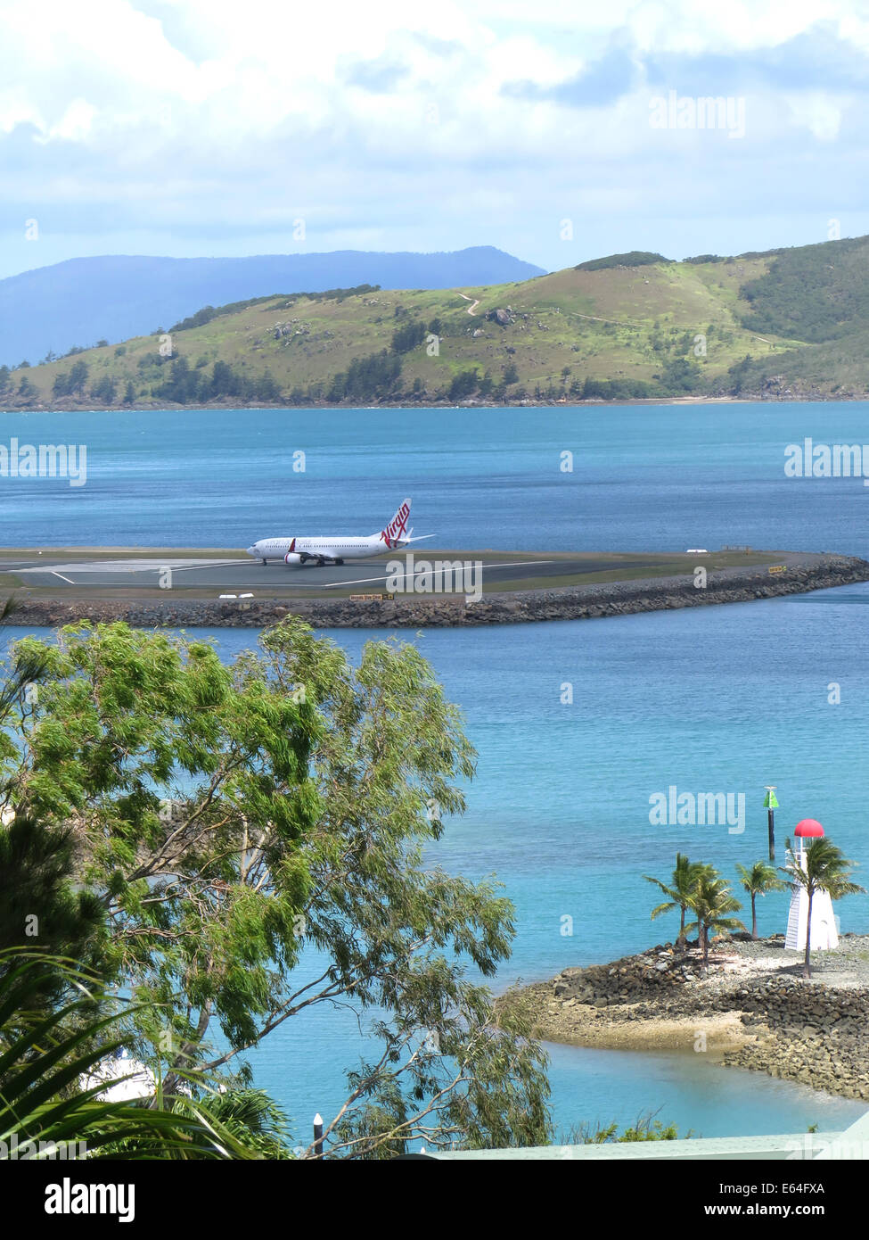 Virgin 737- 400 Airplane awaiting take off at Hamilton Island Airport, Whitsunday Islands, Australia. Stock Photo