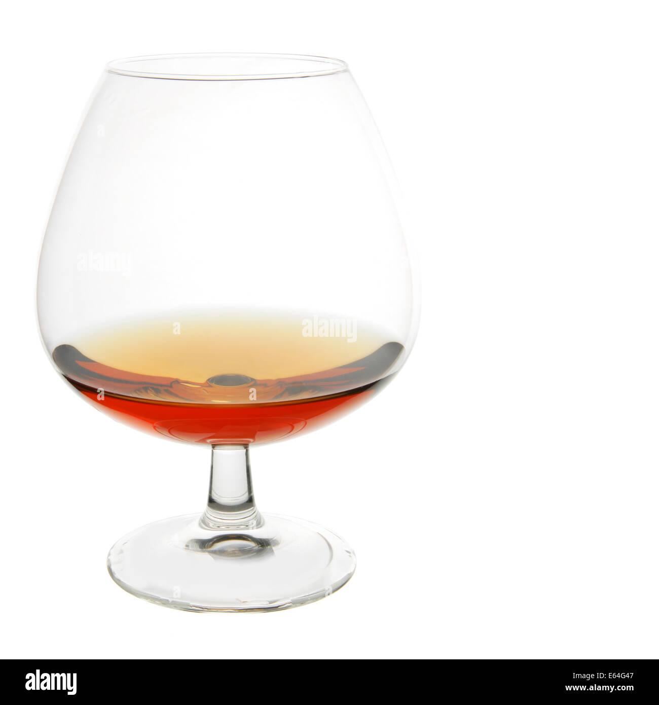 Snifter glass of cognac isolated over white background Stock Photo Alamy