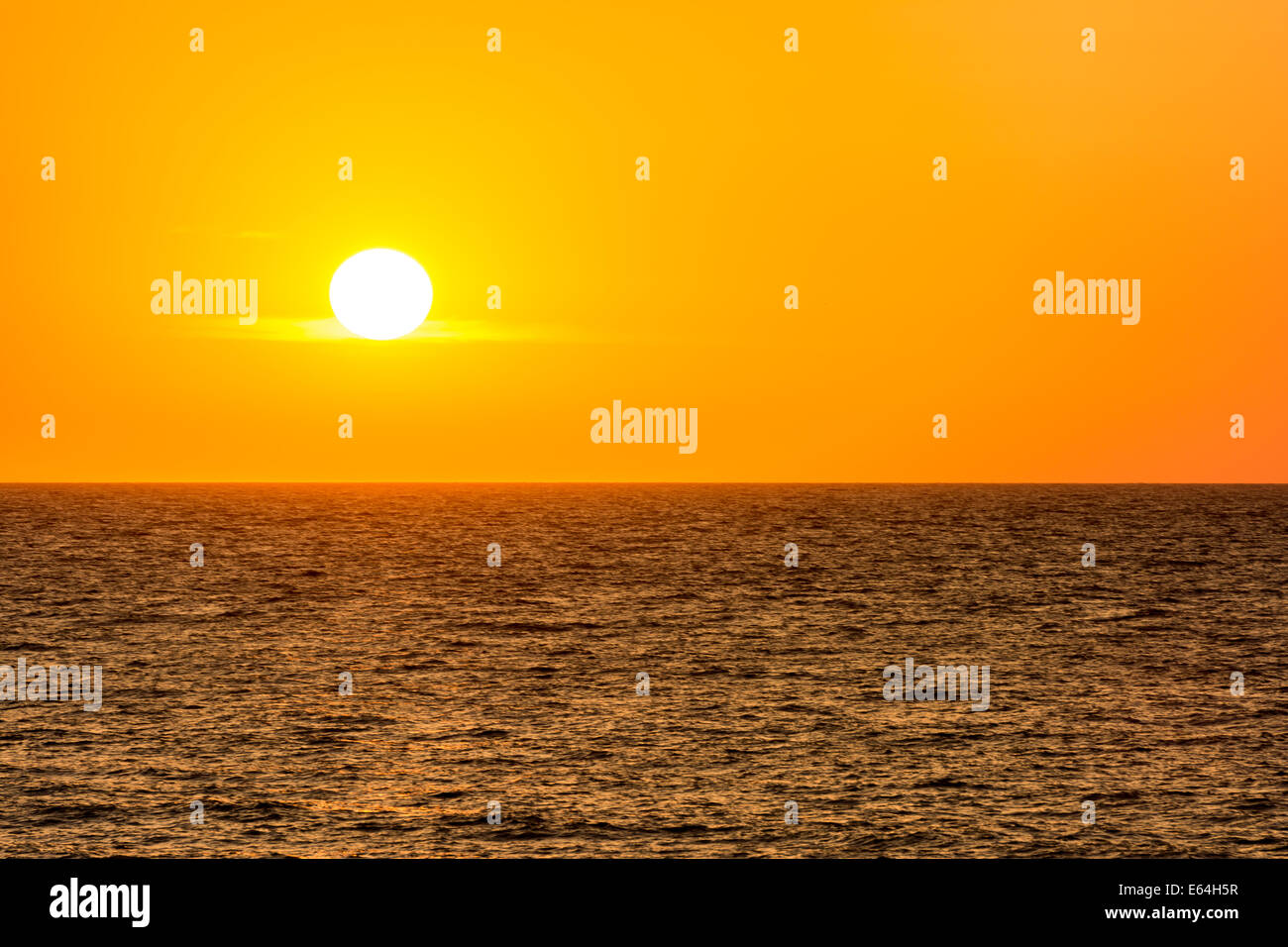 Orange Morning Sky Sunrise Over The Ocean Stock Photo - Alamy