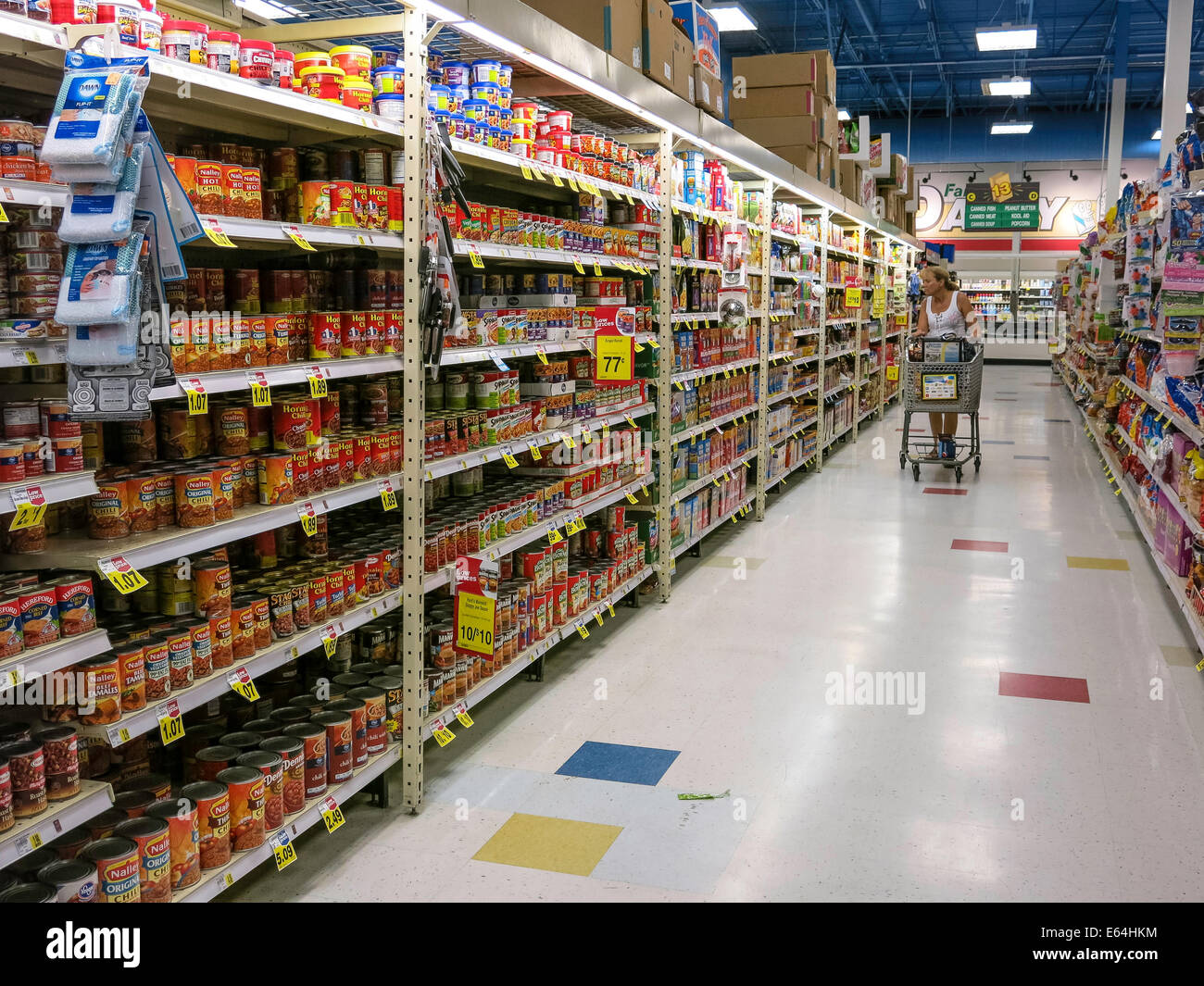 Shopper and Cart in Aisle, Smith's Grocery Store, Great Falls, Montana, USA Stock Photo
