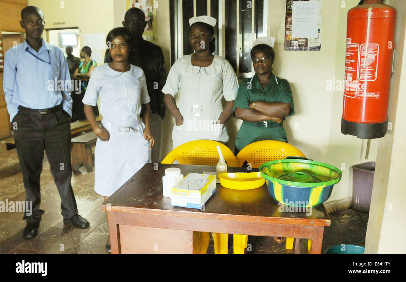 Freetown, Sierra Leone. 14th Aug, 2014. Health workers are seen at the