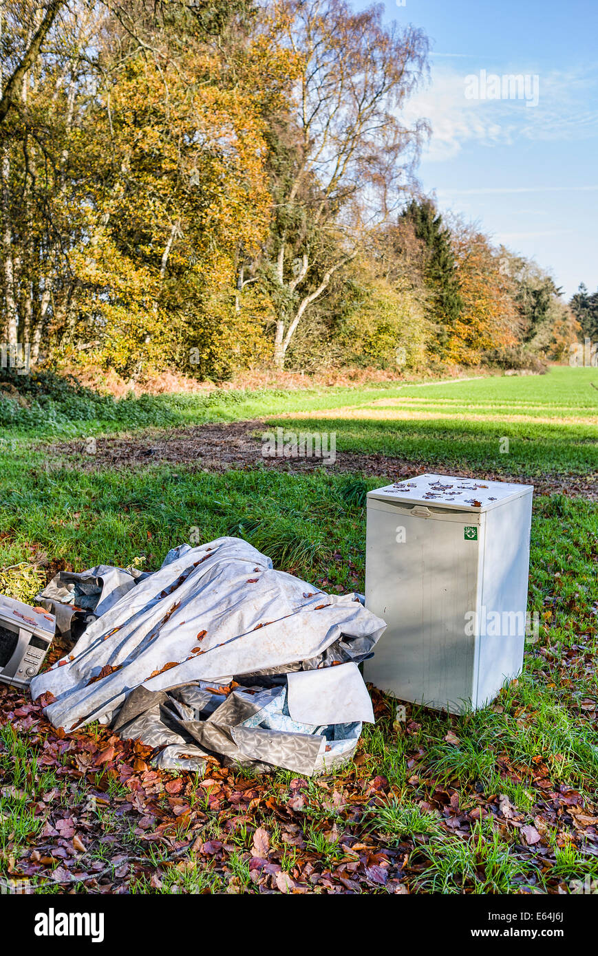 FLY-TIPPING in a farmer's field of cropsconcept, conceptual, concepts, space, Stock Photo