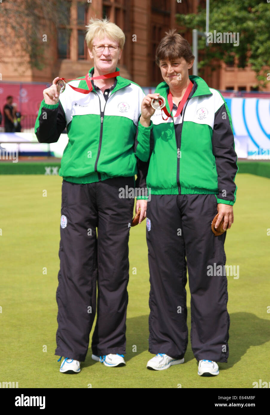Barbara CAMERON & Mandy CUNNINGHAM of Northern Ireland (Bronze) in the Womens Pairs at the Kelvingrove Lawn Bowls Centre, 2014 Stock Photo