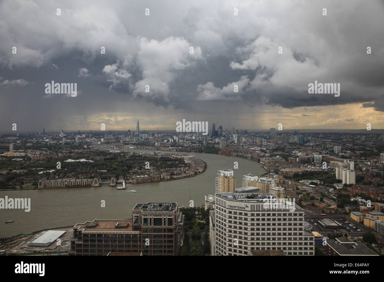 LONDON UK, 14th August 2014. A heavy rainstorm passes over London at the start of the evening rush hour. This photo taken from Canary Wharf in London's Docklands financial district Credit:  Steve Bright/Alamy Live News Stock Photo