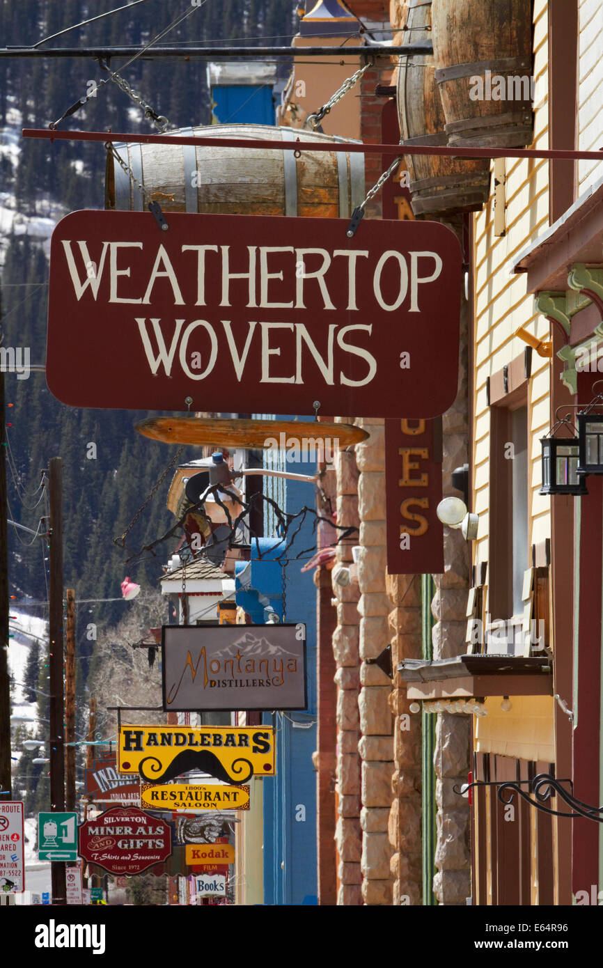 Shop signs in the historic mining town of Silverton, San Juan Mountains, Colorado, USA Stock Photo