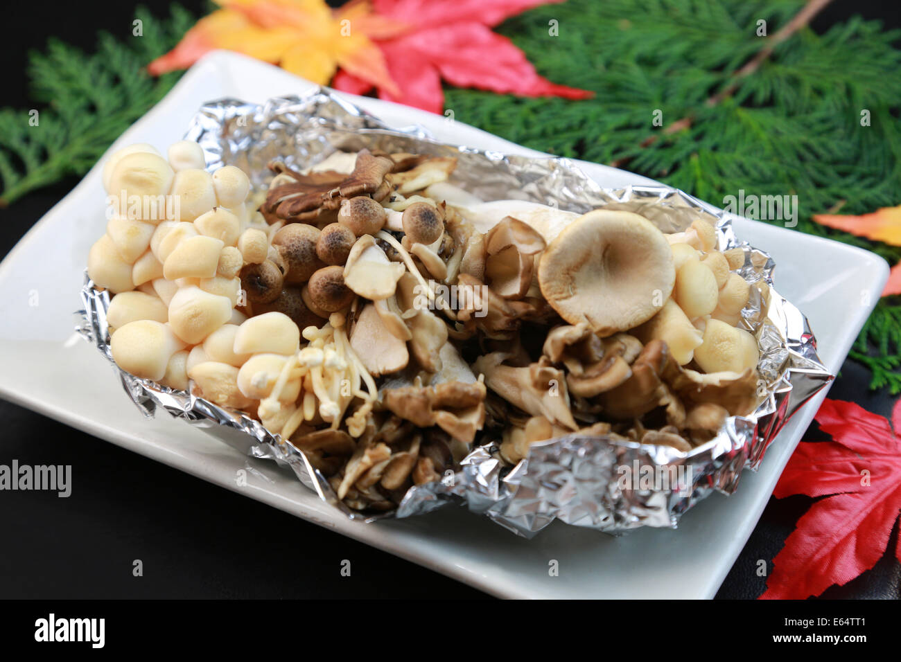 Grilled mushrooms in foil Stock Photo Alamy