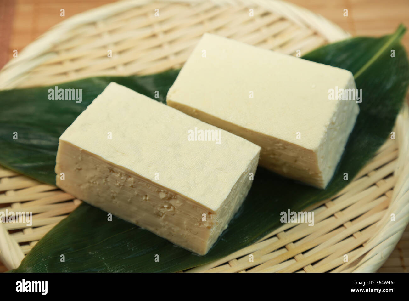 Firm Tofu on a Chopping Board with shape cutter Stock Photo - Alamy