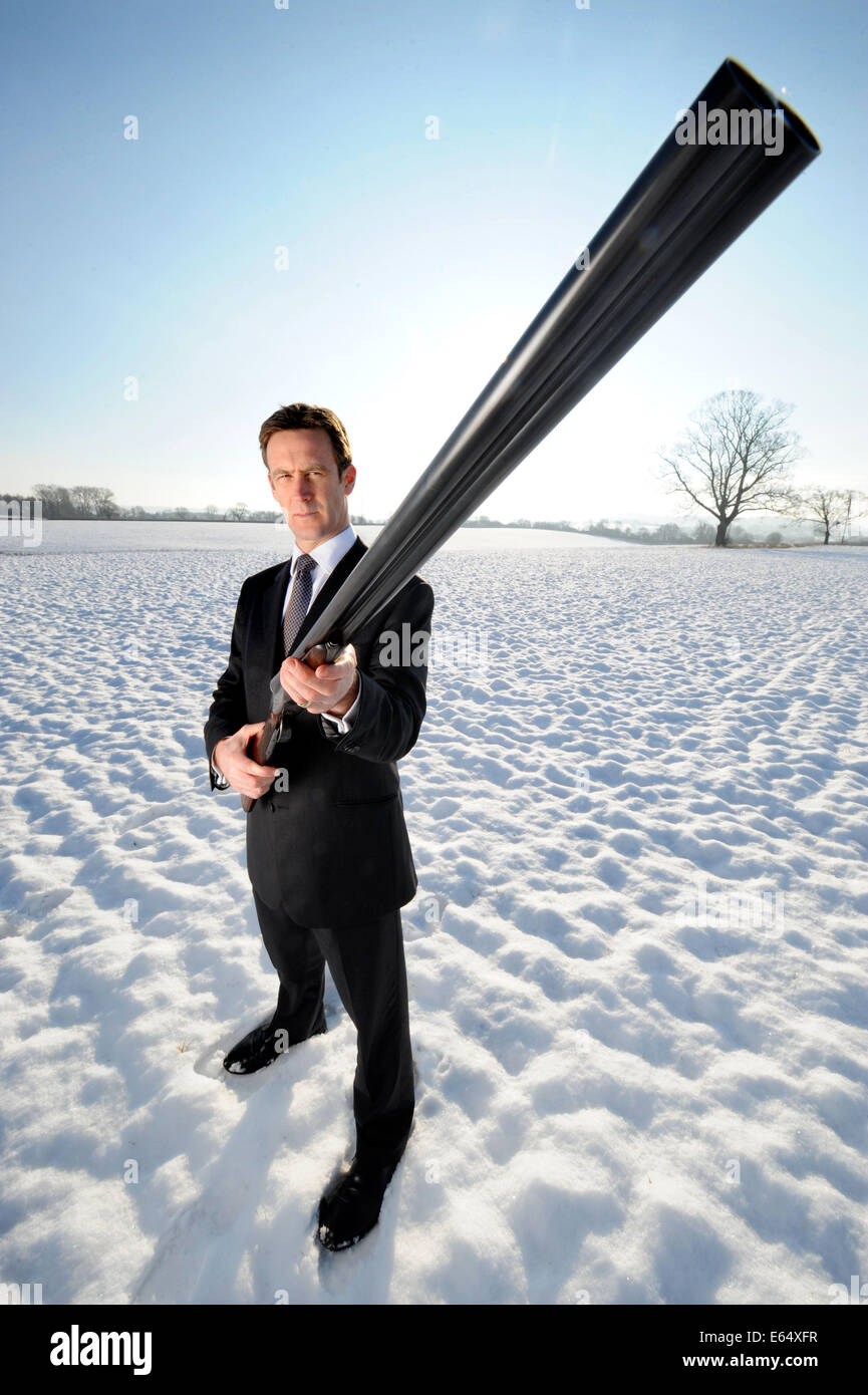 A gun collector who has invested in K D Radcliffe shotgun UK 2010 Stock Photo
