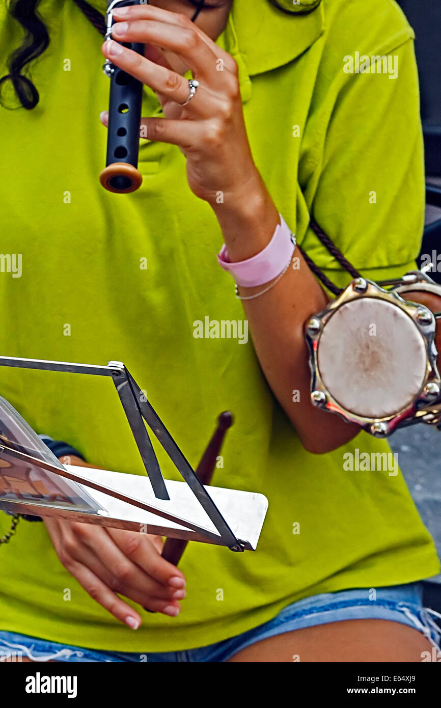 Singer who singing spanish catalan music with specific instruments, on the street. Stock Photo
