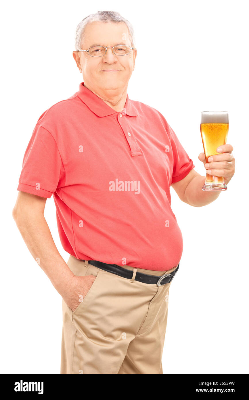 Joyful senior holding a pint of beer Stock Photo