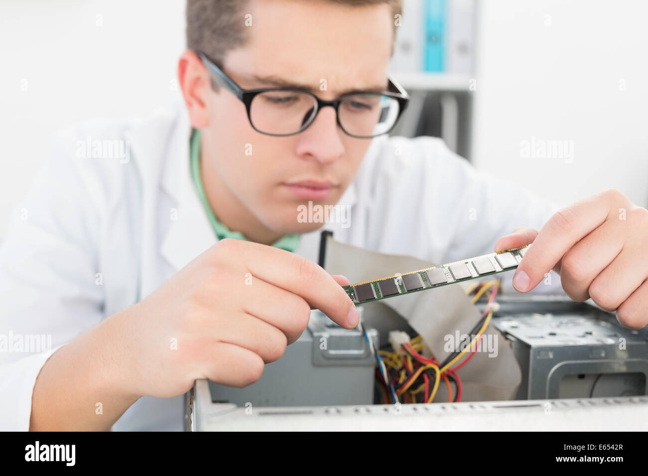 Technician working on broken cpu Stock Photo - Alamy