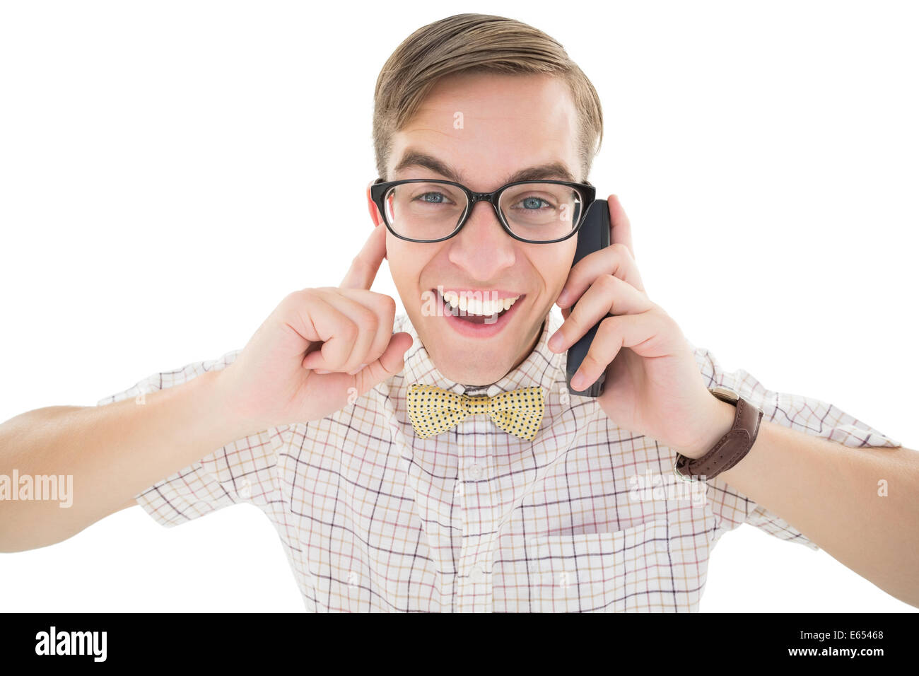 Nerdy hipster talking on retro phone Stock Photo