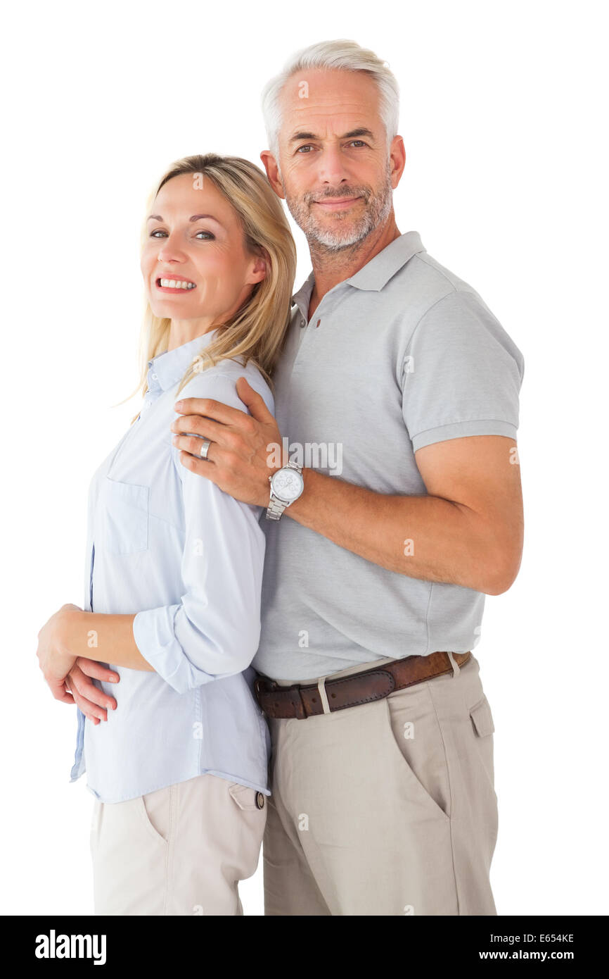 Happy couple smiling at camera Stock Photo - Alamy