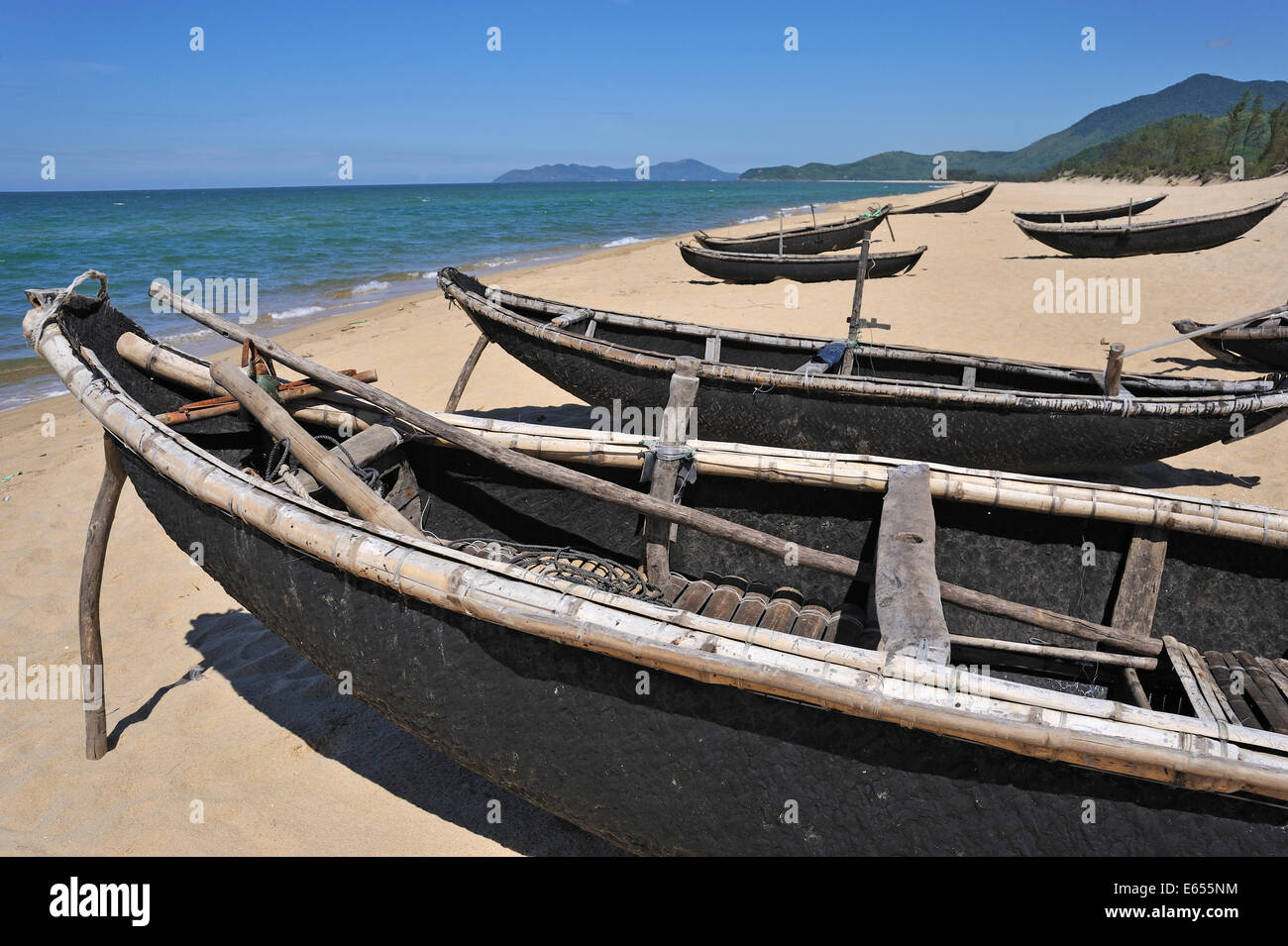 Traditional fishing boats on Vinh Hien beach, near Hue, Vietnam, Southeast Asia Stock Photo