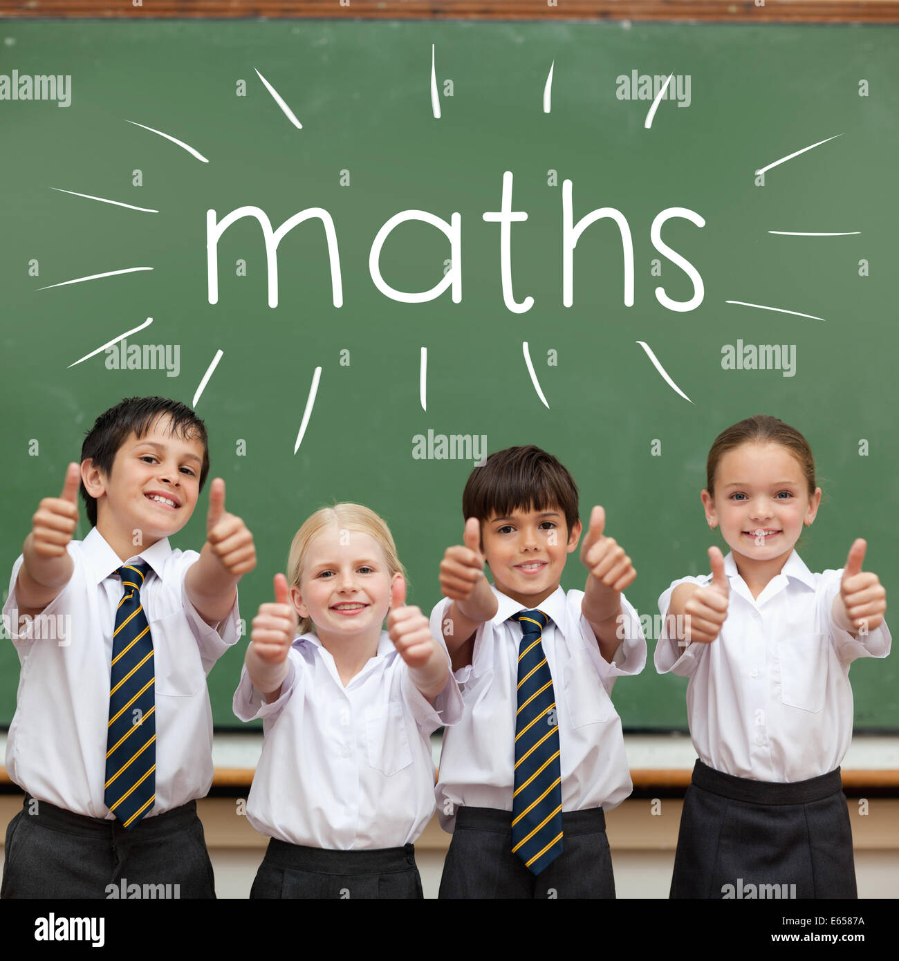 Maths against cute pupils showing thumbs up in classroom Stock Photo ...
