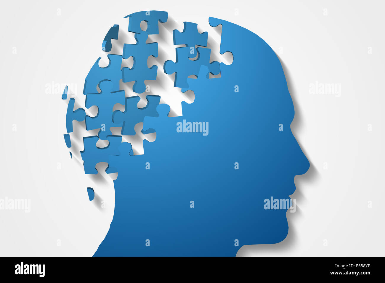 Blue jigsaw head with missing pieces Stock Photo