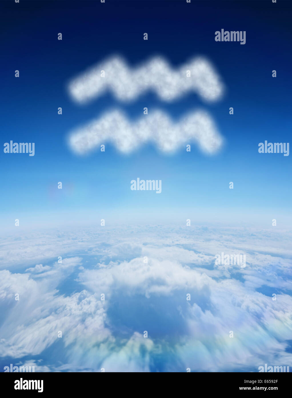 Composite image of cloud in shape of aquarius star sign Stock Photo
