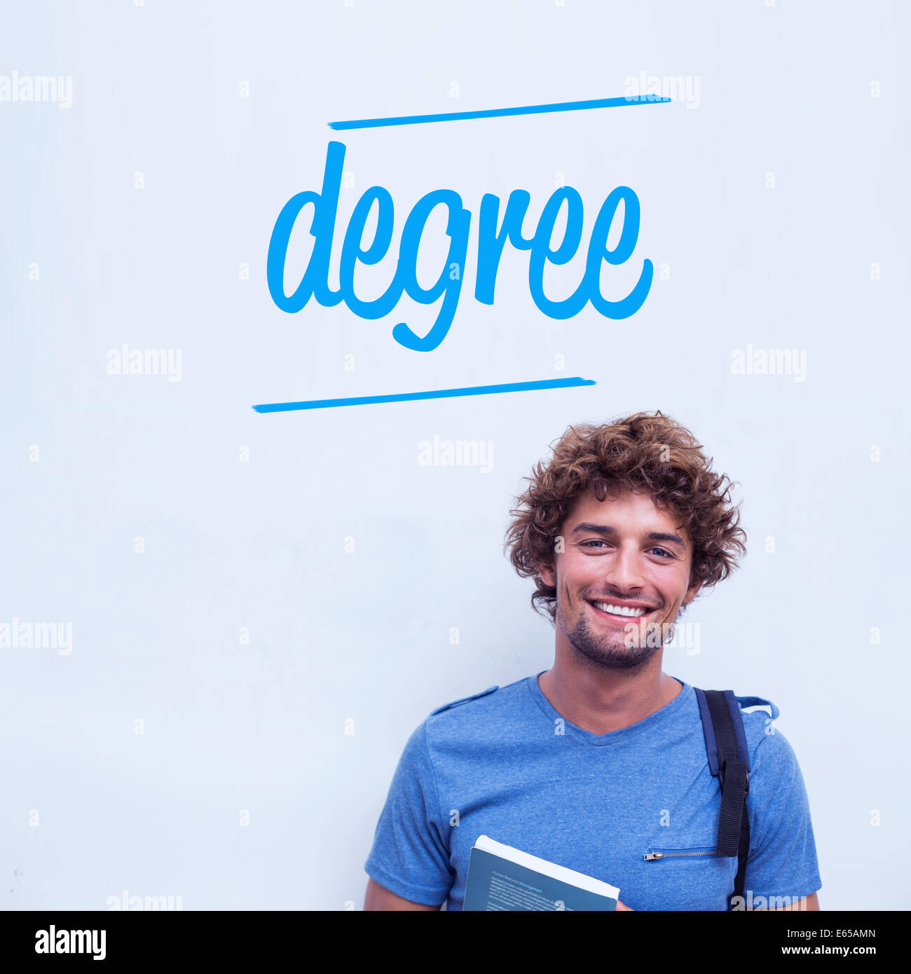 Degree against happy student holding book Stock Photo