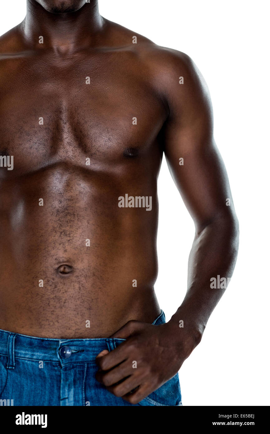 Close-up mid section of a shirtless muscular man Stock Photo