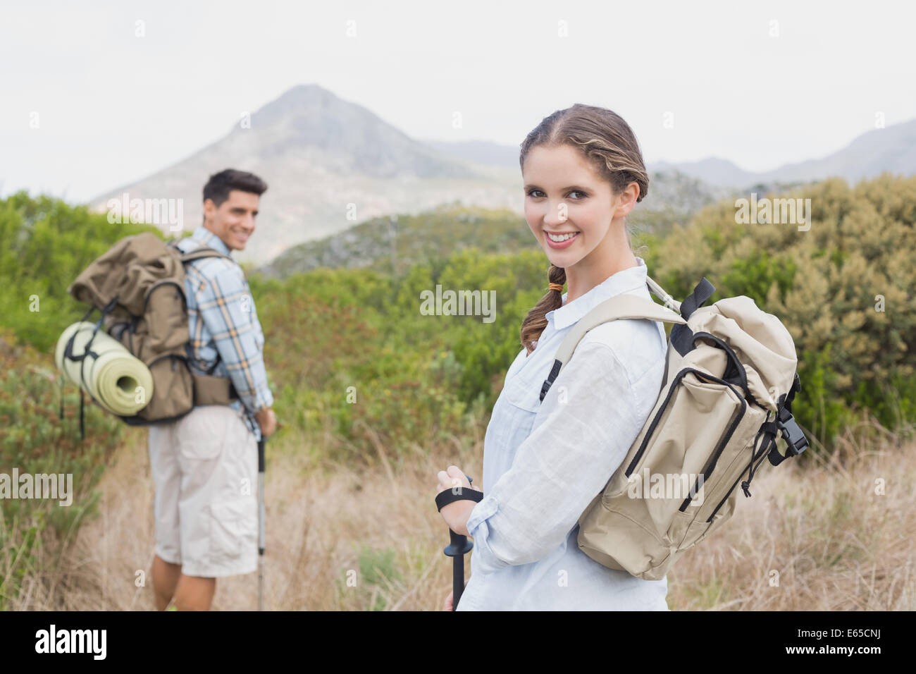 Hiking smile walking couple hi-res stock photography and images - Alamy