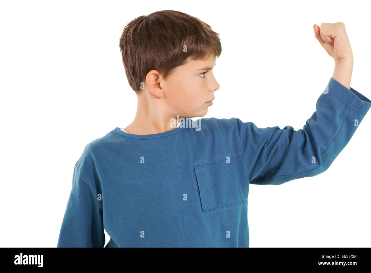 Cute little boy flexing his arm Stock Photo Alamy