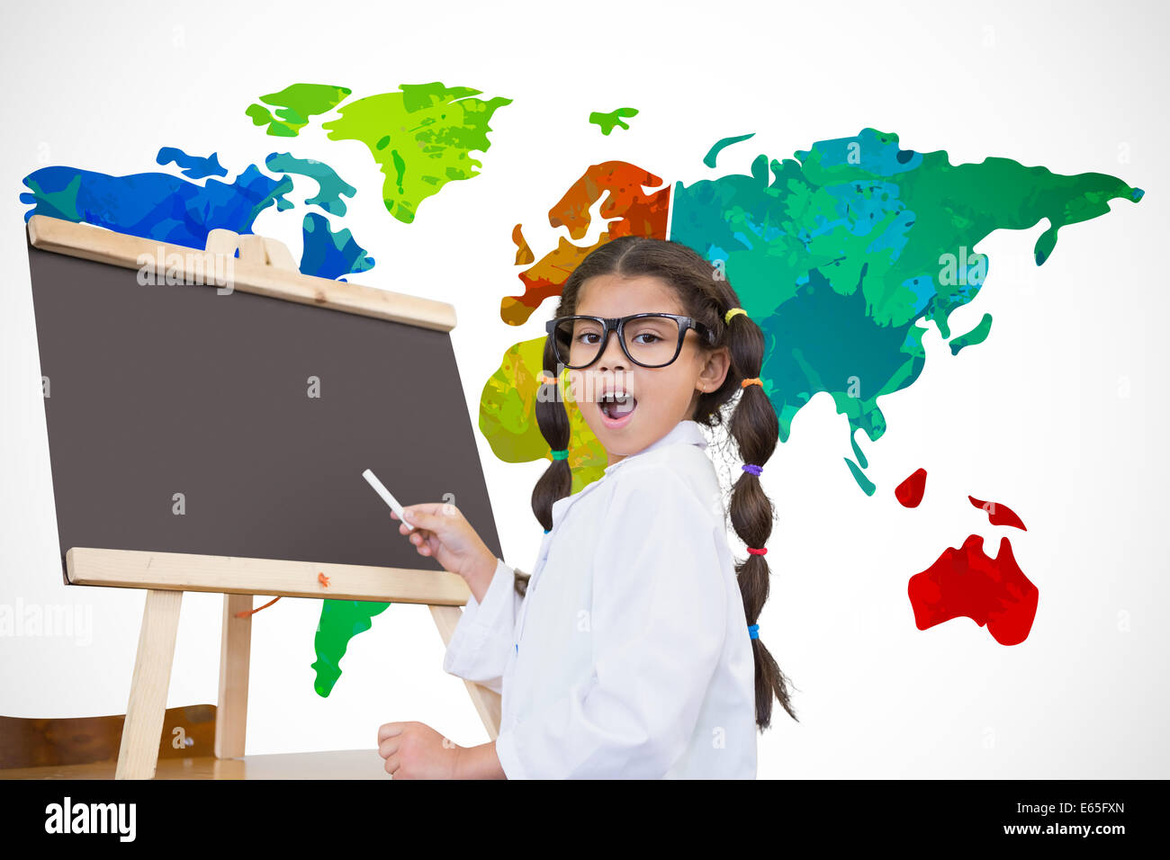 Composite image of cute pupil with chalkboard Stock Photo