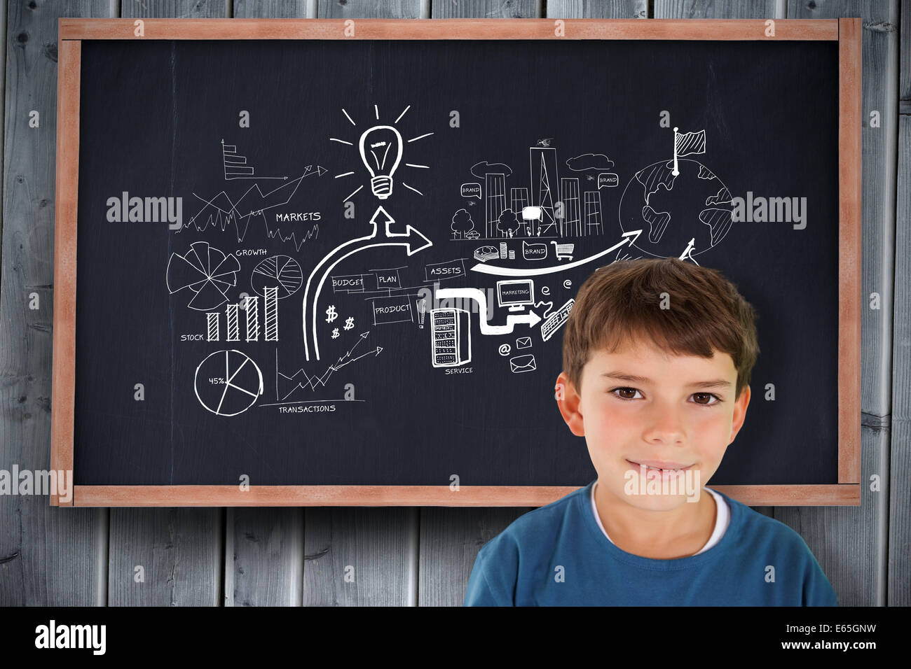 Composite image of cute boy smiling Stock Photo - Alamy
