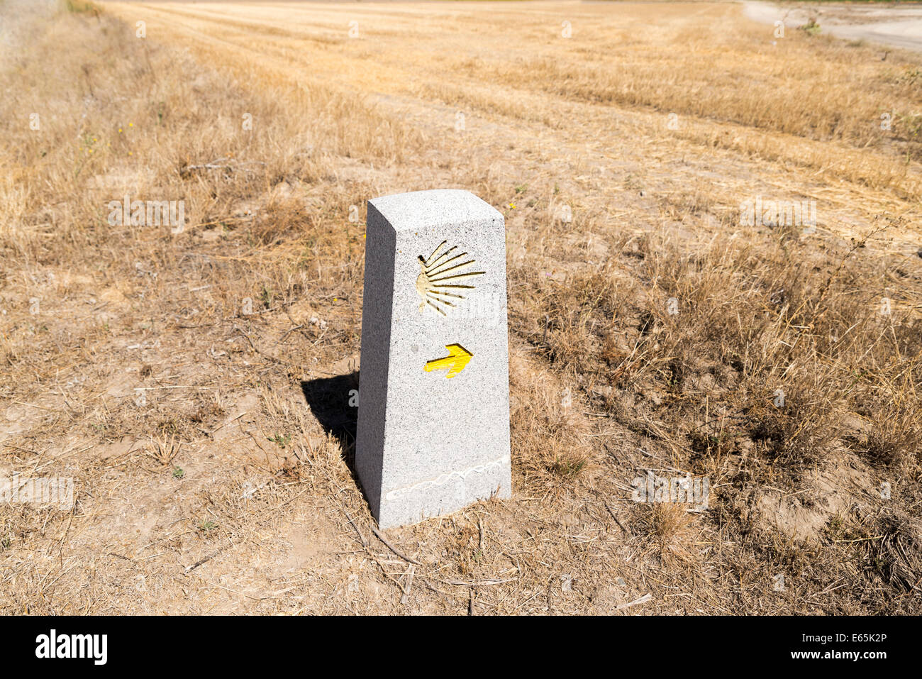 Milestone with the Saint James Shell on it, showing that you are on the right path on the Way of Saint James (Camino de Santiago Stock Photo