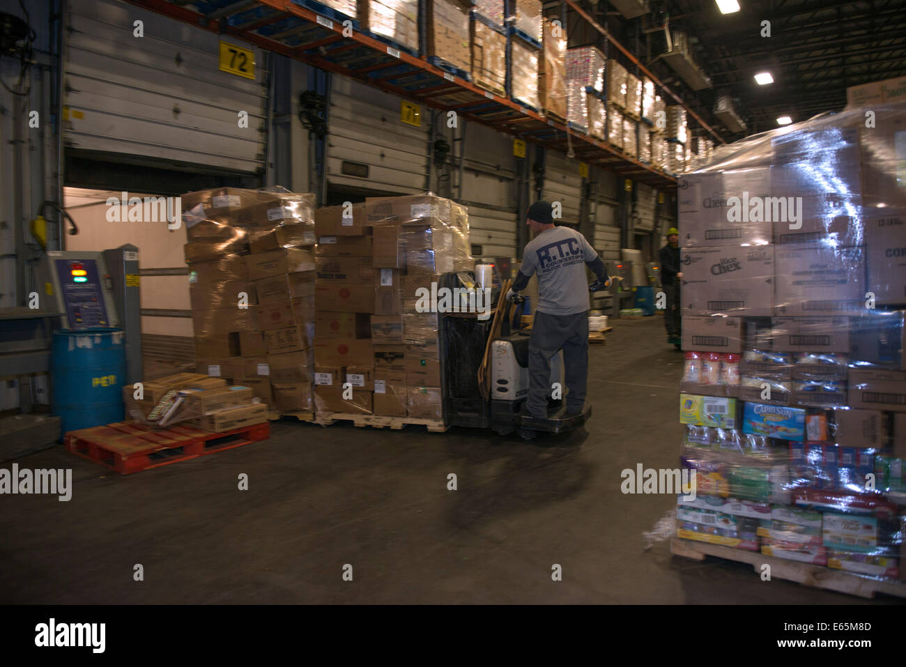 Refrigerated area in giant warehouse of food distributor Bozzuto's. 150 trucks supply IGA and